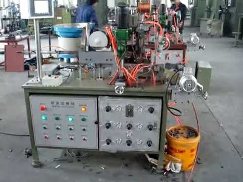 Automatic carbon brush tamping machine