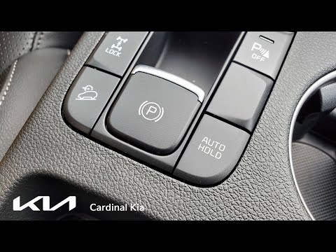 Part of a video titled CK - 2022 Kia Sportage - How To Use Your Electronic Parking Brake w