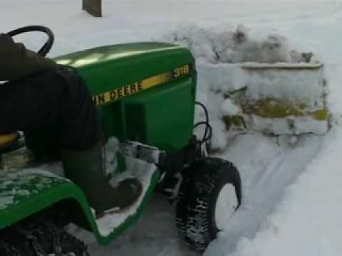 John Deere 318 Plowing Snow Blizzard Dec 2009