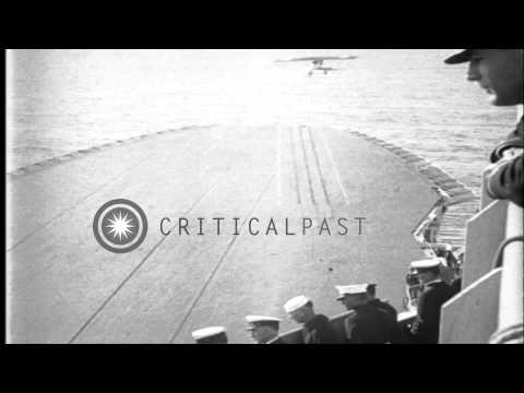 Biplanes on flight deck of USS Saratoga prepare to take off. HD Stock Footage