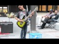Black kid playing heavy metal music on guitar in New ...