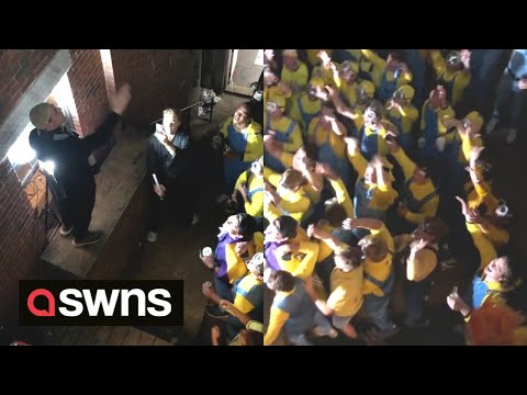 Over 70 people dress as ‘Minions’ and cheer the arrival of leader 'Gru’ at Halloween party | SWNS