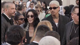 Cher and Alexander Edwards at the Valentino Womenswear Spring/Summer 2024 Fashion show in Paris