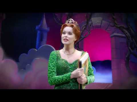Curtain-call trailer beat with company bows and confetti