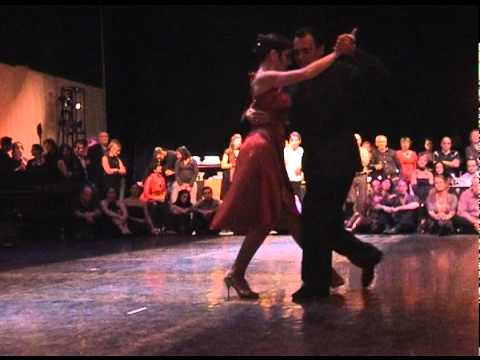  Esteban Moreno  and  Claudia Codega  are  dancing  to  a  tango