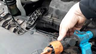 Flushing a cooling system following a failed oil cooler