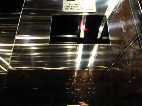 Fast Otis Traction elevators in the high rise bank at the Millennium Hilton