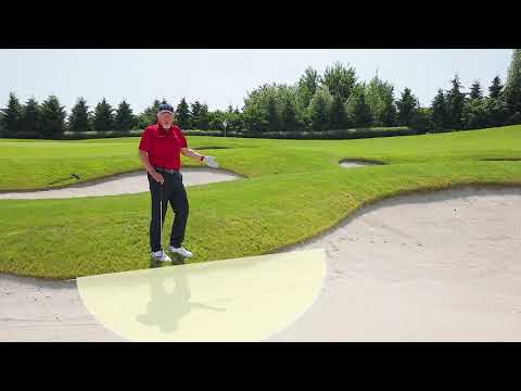 6.  Ball embedded in a lip of bunker