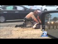 Driver records CHP officer punching woman 