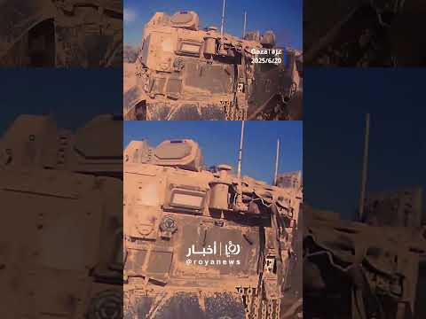 Qassam fighters chase an ‘Israeli’ tank