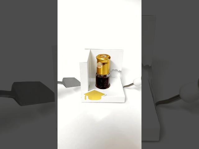 علبة توزيعات تخرج بارز ابيض - 20 حبه