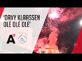 Ajaxfans onthalen bus met vuurwerk na behalen bekerfinale