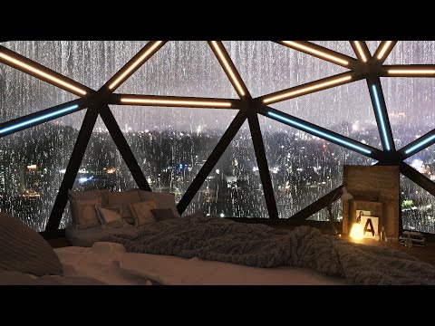 Cool bedroom surrounded by windows on a rainy day