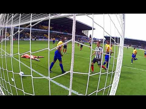 BEHIND THE GOAL: Lee Angol scores the fourth goal against Grimsby
