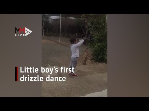Drizzle dance 18 month old boy dances in his first rain