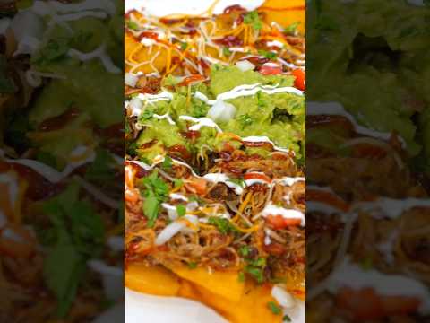 These Pulled Pork Nachos disappear faster than you can say ‘Game Day #nachos #bbqrecipe #pulloork