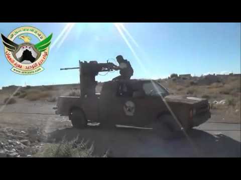 استهداف تحصينات قوات النظام في حاجز الدحروج في معرة النعمان بواسطة الرشاشات الثقيلة من قبل لواء درع التوحيد