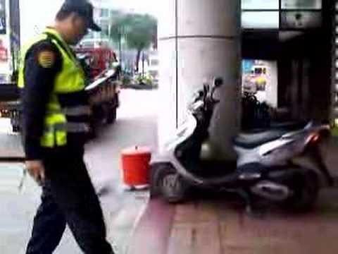 Illegally Parked Bikes Being Towed Away in Taipei