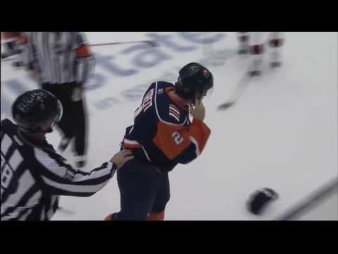 Olivier Magnan-Grenier vs Mark Streit Sep 23, 2009