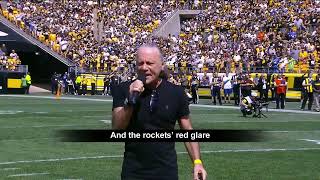 Bruce singing the USA national anthem at the game between the Steelers and the Seahawks!