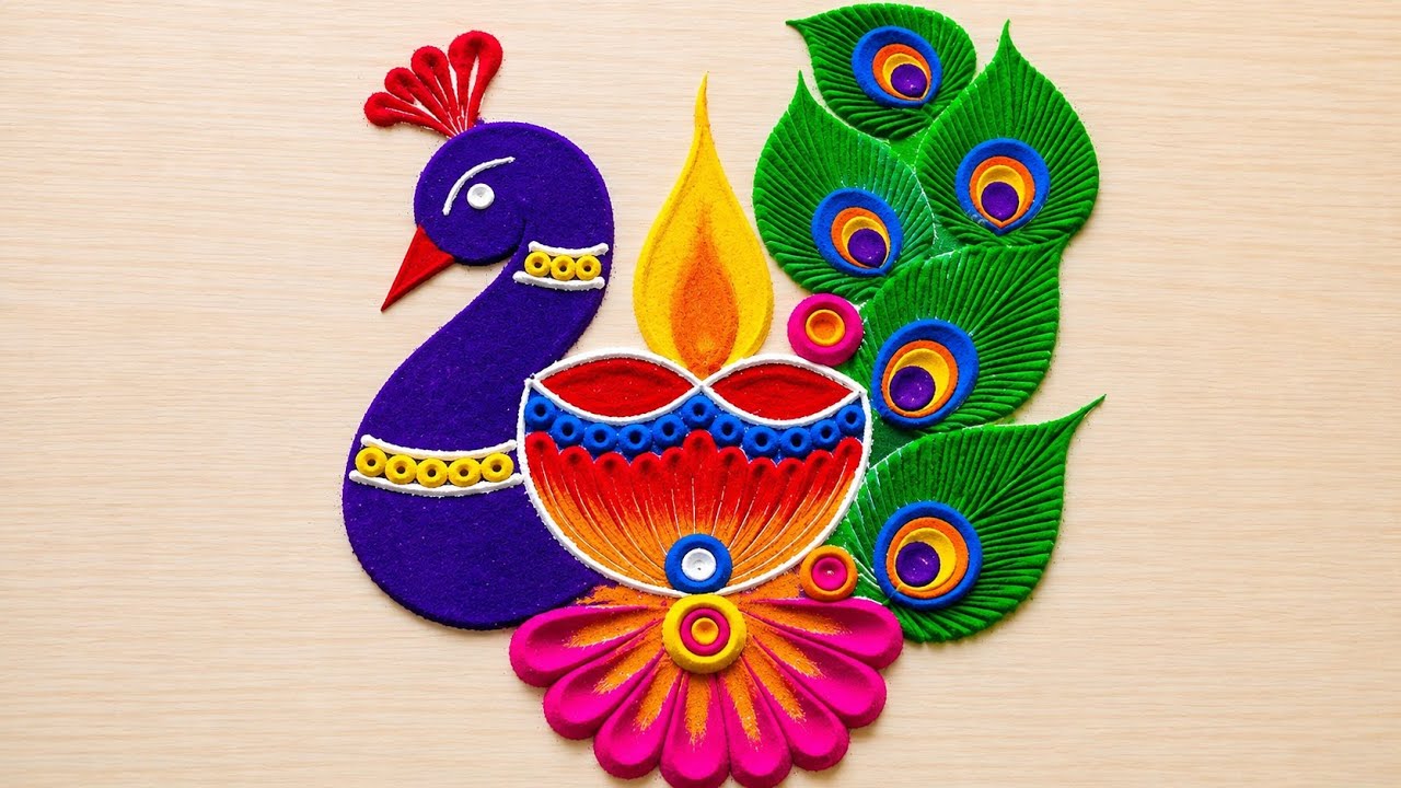 Small peacock rangoli design by pallavi vinod