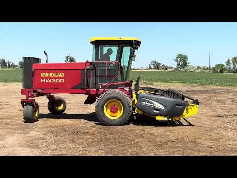 New Holland  HW300 Swather w/ NH Haybine HS Series 12' Header