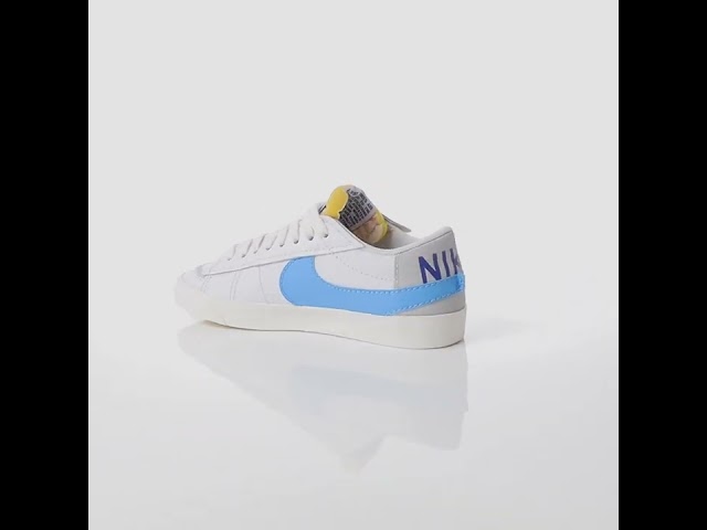Zapatillas de deporte blancas y azules con logo doble efecto spray Blazer  Low '77 de Nike