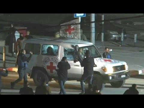 Released hostages cross Rafah border to Egypt aboard Red Cross convoy | AFP