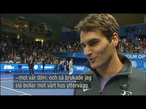 Roger Federer with ball kids at 2010 Stockholm Open