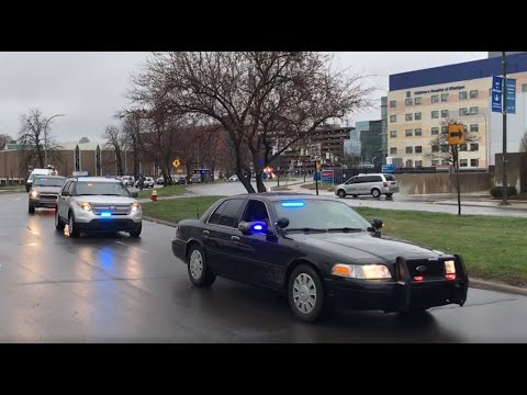 Detroit-area law enforcement form a parade to honor healthcare heroes