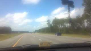preview picture of video 'Blue Florida Ford Mustang Versus Green Georgia Exit Sign'