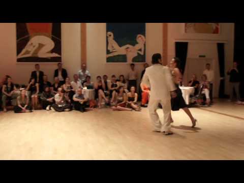  Diego Riemer  and  Maria Belen Giachello  are  dancing  to  the  milonga  "  El Pajaro  "  or  "  Haceme Cu-cu  "  by  Héctor Varela  in  2012