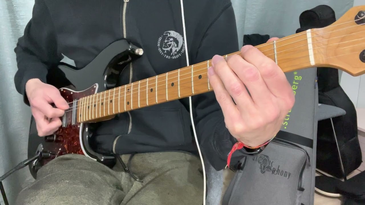 Guitar close-up playing the tritone-based YYZ intro riff by Rush