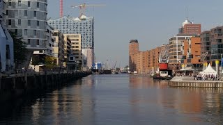 preview picture of video 'Hamburg, Germany: HafenCity (Harbor City), Magellan-Terrassen, view to Sandtorhafen - 4K Video Photo'