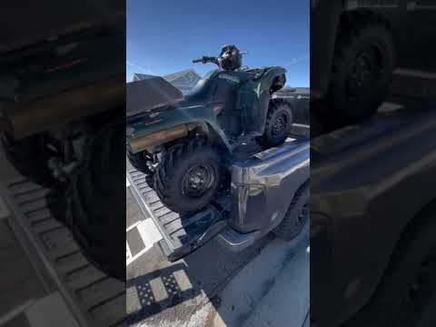 Loading an ATV on top of a DECKED Drawer System