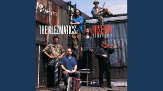 Music video thumbnail preview for Perets Tants by The Klezmatics