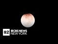 Videos show rare "Blood Worm Moon" during total lunar eclipse