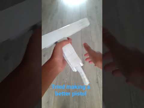 day 2 of making a paper gun. #paper #shorts #youtubeshorts   comment what i should make next