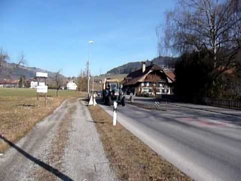 Dreschmaschine mit Lanz Bulldog in fahrt