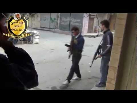 استعداد مقاتلي كتيبة عمر المختار للهجوم على مواقع قوات النظام في مدينة داريا في ريف دمشق