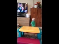 Logan dances to Mormon Tabernacle Choir singing