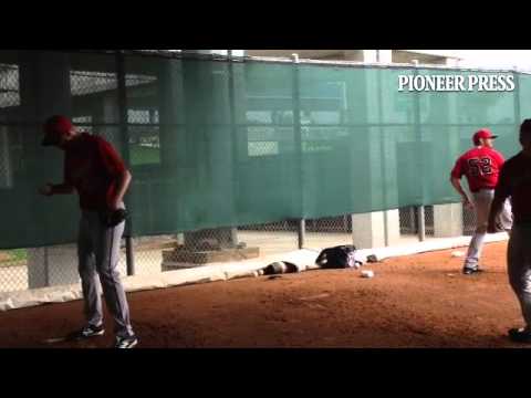 Video: Michael Tonkin (L) fires a ball off the backstop near end of this clip. Blaine Boyer also thr