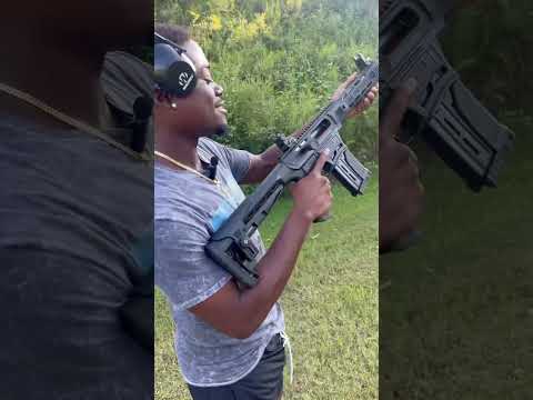 AR-12 knocking down steel 💪🏿 #viral #shorts #ar12 #gun