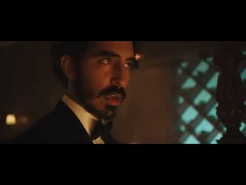 Monkey Man official trailer frame — Dev Patel’s Kid masked, framed in neon and shadow