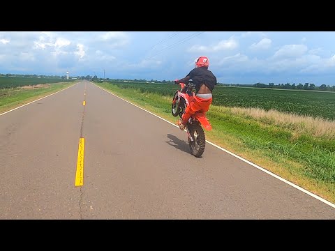 CRAZY DIRT BIKE ROAD WHEELIES!! (EPIC FAIL) | DIRT BIKE DIARIES EP.147