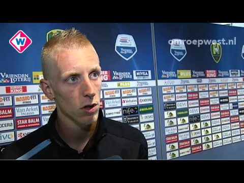 Voordeur Lex Immers groen en geel geverfd