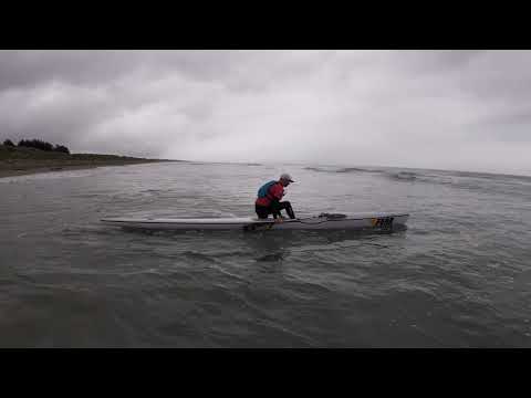 Off the beach ocean surf ski start.