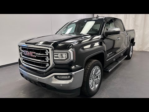 2018 GMC Sierra 1500 4WD Crew Cab Short Box SLT in Black for sale at Davis GMC Buick Lethbridge in Lethbridge, AB