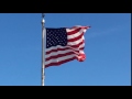 U.S. Flag in a stiff Texas breeze, at Camp Wisdom, Circle 10 Council BSA, Dallas, Texas