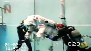 Astronaut Naoko Kadono Yamazaki EMU spacesuit rolling underwater